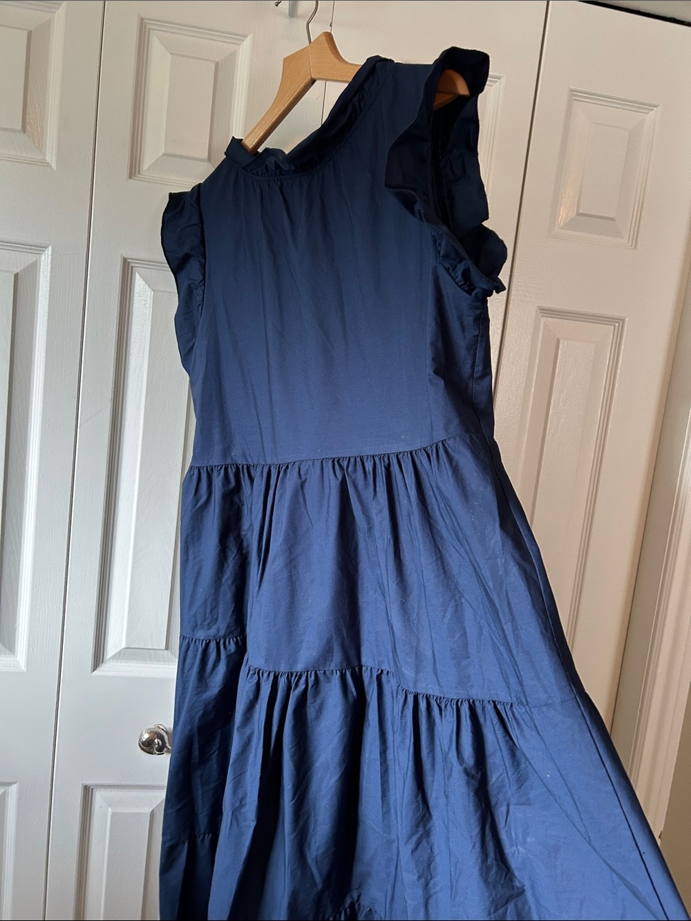 100% cotton Tiered navy Dress with flattering ruffled shoulders and neck. Lg